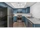 Updated kitchen featuring stainless steel appliances and ample cabinet space at 1075 E Chandler Blvd # 210, Chandler, AZ 85225