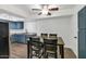 Bright dining area adjacent to kitchen with stainless steel appliances and granite countertops at 1075 E Chandler Blvd # 210, Chandler, AZ 85225