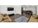 Spacious living area with an open layout and seamless flow to the dining area at 1075 E Chandler Blvd # 210, Chandler, AZ 85225