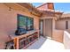 Outdoor patio featuring an inviting seating area with a built-in table and chairs, perfect for outdoor relaxation at 1075 E Chandler Blvd # 210, Chandler, AZ 85225