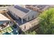 Aerial view of a private backyard featuring a pool, patio, and solar panels at 13529 W Remuda Dr, Peoria, AZ 85383