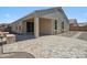 Spacious backyard features an extended covered patio with views of the surrounding area at 13529 W Remuda Dr, Peoria, AZ 85383
