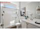 Sleek bathroom with walk-in shower and modern vanity with clean lines at 13529 W Remuda Dr, Peoria, AZ 85383