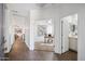 Bright hallway featuring an office and bathroom at 13529 W Remuda Dr, Peoria, AZ 85383