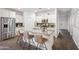 Bright kitchen features a large island with granite countertops and modern stainless steel appliances at 13529 W Remuda Dr, Peoria, AZ 85383