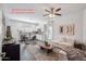Cozy living space with neutral colors, stylish decor, and convenient kitchenette at 13529 W Remuda Dr, Peoria, AZ 85383