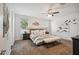 Spacious Primary bedroom with ceiling fan, neutral tones, and cozy decor creates a relaxing retreat at 13529 W Remuda Dr, Peoria, AZ 85383
