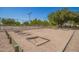 A horseshoe pit with multiple lanes in a community park at 15131 W Melissa Ln, Surprise, AZ 85374