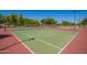 A tennis court with fenced surrounding in a community park at 15131 W Melissa Ln, Surprise, AZ 85374