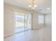 Bright living area with sliding glass doors offering backyard views and plenty of natural light at 15205 N Honcho Ct, El Mirage, AZ 85335