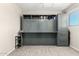 Bedroom with stylish hardwood floors and a built-in murphy bed, folded up at 1531 W Campo Bello Dr, Phoenix, AZ 85023