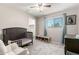 Bedroom with a crib, hardwood floors and a window at 1531 W Campo Bello Dr, Phoenix, AZ 85023