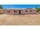 Charming single-story home with a light pink exterior, a tidy yard, and a welcoming entrance at 1531 W Campo Bello Dr, Phoenix, AZ 85023