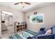 Living room with hardwood floors, large window and a couch at 1531 W Campo Bello Dr, Phoenix, AZ 85023