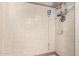 Updated shower with tile surround and hand held fixture at 1531 W Campo Bello Dr, Phoenix, AZ 85023