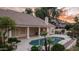 Inviting backyard pool with tile surround, covered patio, and lush landscaping for relaxing outdoor living at 16239 S 18Th Pl, Phoenix, AZ 85048