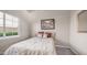 Cozy bedroom featuring a comfortable bed, soft lighting, and warm, inviting colors at 16239 S 18Th Pl, Phoenix, AZ 85048