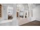 Grand foyer featuring tiled floors, soaring columns, and a view into the formal dining room at 16239 S 18Th Pl, Phoenix, AZ 85048