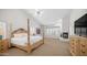 Spacious main bedroom with vaulted ceilings, fireplace, and abundant natural light at 16239 S 18Th Pl, Phoenix, AZ 85048