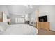 Bright main bedroom features a fireplace, french doors and vaulted ceilings at 16239 S 18Th Pl, Phoenix, AZ 85048