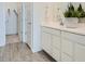 Clean, bright bathroom with double sink vanity and modern finishes at 16743 W Charlotte Dr, Surprise, AZ 85387