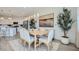 Open-concept dining area with modern decor and plenty of natural light at 16743 W Charlotte Dr, Surprise, AZ 85387