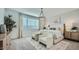 Elegant main bedroom with plush bedding and contemporary decor at 16743 W Charlotte Dr, Surprise, AZ 85387