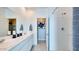 Clean and modern bathroom with a double sink vanity and walk-in shower at 16762 W Alameda Rd, Surprise, AZ 85387
