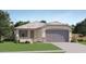 Charming single-story home with a well-manicured lawn and a neutral color palette at 16762 W Alameda Rd, Surprise, AZ 85387