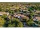 Aerial view of backyard showcasing a swimming pool, covered patio and ' playset at 1758 E Carver Rd, Tempe, AZ 85284