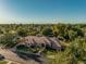 Beautiful single-Gathering home featuring well-manicured landscaping, a circular driveway, and a welcoming entrance at 1758 E Carver Rd, Tempe, AZ 85284