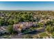 Aerial shot showcasing a residential property, lush landscaping, and convenient street access at 1758 E Carver Rd, Tempe, AZ 85284