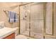 Shower stall has tiled walls and a gold frame at 1758 E Carver Rd, Tempe, AZ 85284
