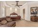 Bedroom suite with ornate dark wood furniture and neutral decor, offering a relaxing retreat at 1758 E Carver Rd, Tempe, AZ 85284