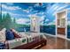 Lake themed bedroom with a unique mural, hardwood floors, and ensuite bathroom at 1758 E Carver Rd, Tempe, AZ 85284