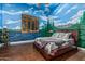 Charming bedroom with beautiful mural, natural light and hardwood floors at 1758 E Carver Rd, Tempe, AZ 85284