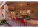 Beautiful covered patio with ample seating and stylish décor, ideal for relaxing and enjoying the outdoors at 1758 E Carver Rd, Tempe, AZ 85284