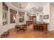 Open-concept kitchen with wooden cabinetry, stainless steel appliances, and breakfast bar with seating for two at 1758 E Carver Rd, Tempe, AZ 85284