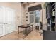 Comfortable office space with natural light, a ceiling fan, and a chess table at 1758 E Carver Rd, Tempe, AZ 85284