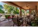 Spacious covered patio with ample seating, overlooking the pool at 1758 E Carver Rd, Tempe, AZ 85284