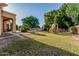 Backyard with playground and patio, a versatile outdoor space for entertaining and Gathering fun at 1758 E Carver Rd, Tempe, AZ 85284