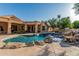 Backyard pool and patio with a covered outdoor space at 1758 E Carver Rd, Tempe, AZ 85284