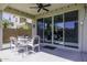 Inviting back patio with outdoor dining area and seamless transition to the home's interior at 1972 N Hubbard Ln, Casa Grande, AZ 85122