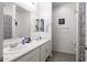 Bright bathroom with double sinks and modern fixtures for a luxurious experience at 1972 N Hubbard Ln, Casa Grande, AZ 85122