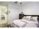 Comfortable bedroom features plush carpet, a ceiling fan, and a spacious closet at 1972 N Hubbard Ln, Casa Grande, AZ 85122