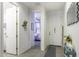 Welcoming hallway with tiled floors, decorative accents, and an open view to a bedroom at 1972 N Hubbard Ln, Casa Grande, AZ 85122