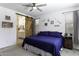 Inviting main bedroom features soft natural light, ample closet space, and neutral decor at 1972 N Hubbard Ln, Casa Grande, AZ 85122