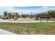 The community playground features a covered area, swings, and other fun activities at 1972 N Hubbard Ln, Casa Grande, AZ 85122