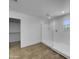 Bright bathroom with a glass-enclosed shower, tiled floors, and a window view at 21262 E Cherrywood Dr, Queen Creek, AZ 85142
