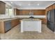 Well-equipped kitchen featuring stainless steel appliances, ample counter space, and a center island at 21262 E Cherrywood Dr, Queen Creek, AZ 85142